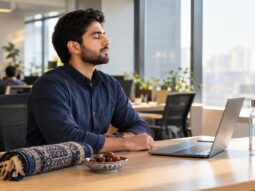 Muslim professional fasting during Ramadan while working at a US office desk